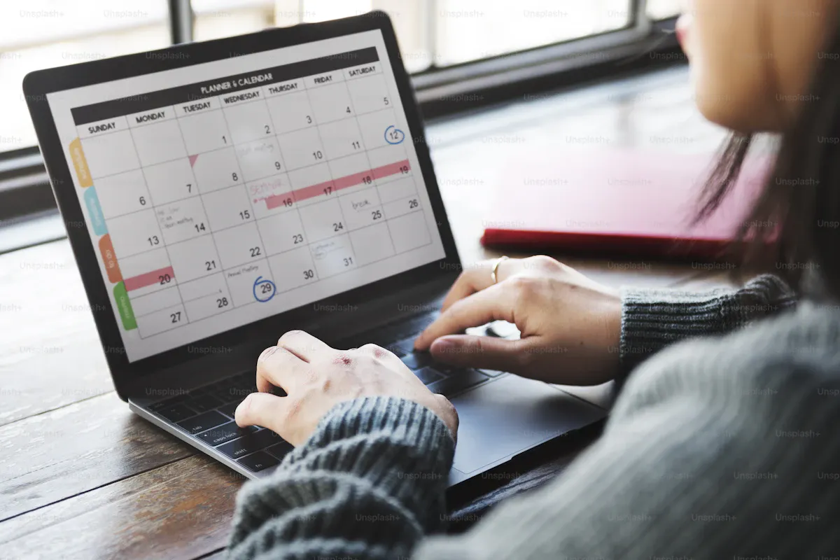 Planner and organiser with dated event blocks, representing online booking and scheduling for personal training